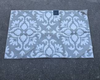 Lot 378 | New Laura Ashley 36×60" All Loop Accent Rug