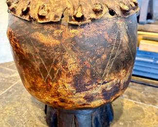 Very old African hand carved wooden drum with wooden pegs.   Carved out of one piece of wood.