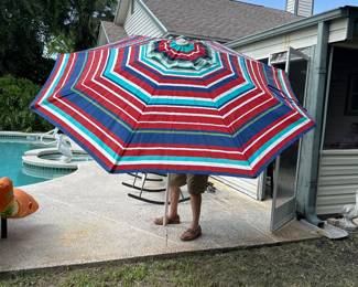 2 outdoor umbrellas both for $22.00