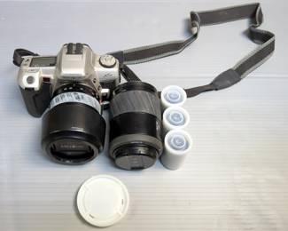 Minolta Camera, With Two Minolta Zoom Lens 28-80 And 70-210, In Carrying Bag With Extra Film, JVC Compact VHS Camcorder Model GR-SX851U, With Battery Charger And Case