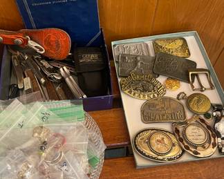 Belt buckles, pocket knives