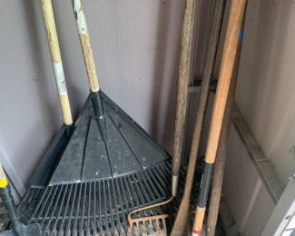 rakes, pitch fork, And other yard tools
