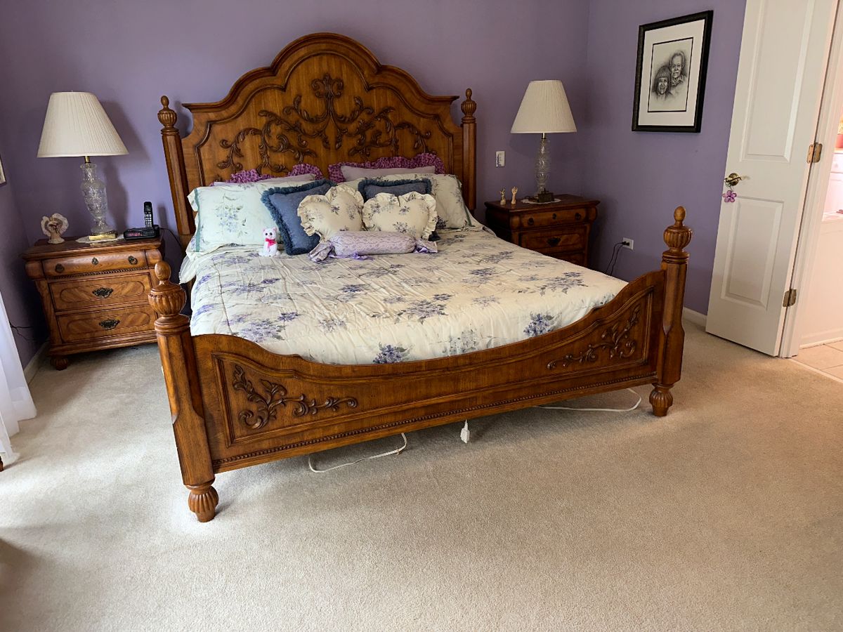 King carved wood  bed matching dresser and nightstands 