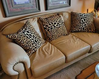 Italian leather gold couch. 2 sections need to be reupholstered. very comfortable.