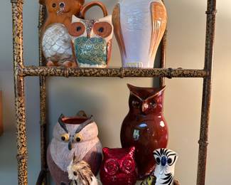 Beautiful shelving unit with four glass shelves.                          - Owl Decor in various finishes