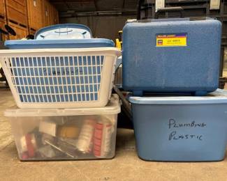 #3100 • Empty Tote & Tote with Plumbing Fitting & Laundry Basket & Yellow Jacket Refrigeration Service Tool & Tote of Tie Downs Flush Gun Kit & more
