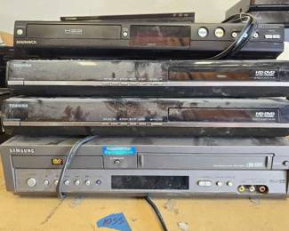 #1032 • 2 Toshiba HD DVD Players 1 Samsung DVD and VHS Player 1 Magnavox HDD and DVD Recorder
