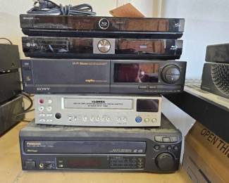 #1036 • 2 Blu-ray Players Laser Disk Player and 2 VHS Players
