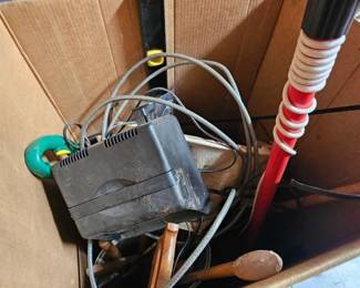 #5550 • Garden Tools, Battery Charger, Saws, and Level
