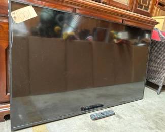 #1001 • Sharp TV with remote
