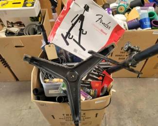 #2564 • 1 Box of Guitars Stands Wire Drum sticks and Microphone Stands
