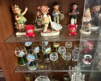 CABINET NOT FOR SALE.   ALL HUMMELS SOLD