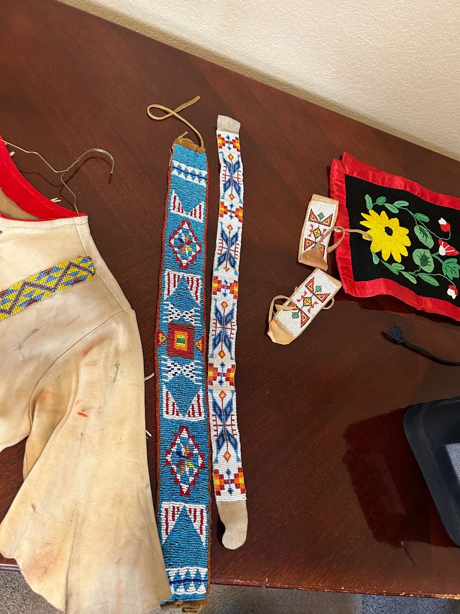 Blue belt is 1950’s Lakota bead work