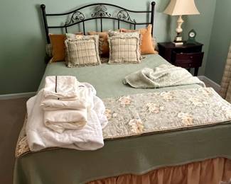 Queen size bed, bedding sold separately.