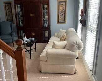 Ethan Allen white sofa and Thomasville MCM cabinet