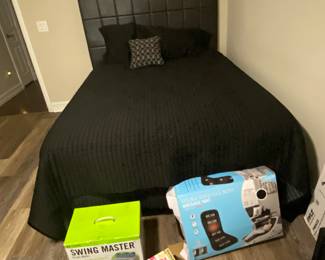 Bed with padded headboard