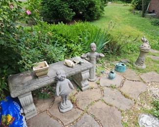 Various Cement Statues and Bench