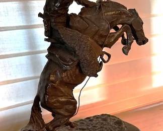 Wooly Chaps bronze sculpture by Frederick Remington, 12" tall