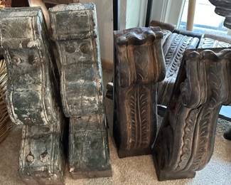 Antique carved wooden corbels and several reproductions