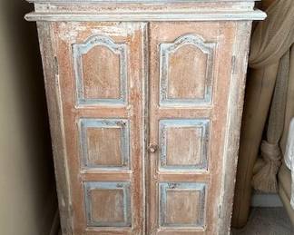Distressed storage cabinet
