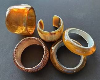 Horned cuff bracelets and acrylic bracelets