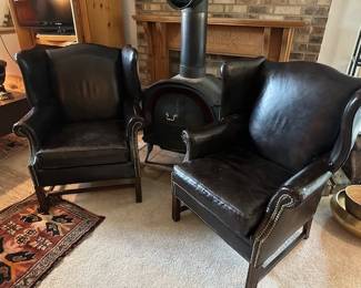 Pair of vintage Georgian style leather and brass wing armchairs