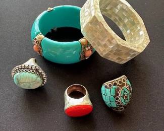 Variety of sterling silver, tibetan, red coral, mother of pearl bracelet and turqoise acrylic and brass bracelet