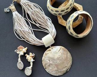 Seashell necklace, wooden bracelets, and shell earrings