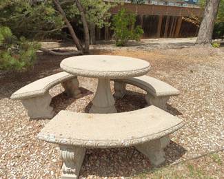 Cement patio set.  Yes, we will help you load it