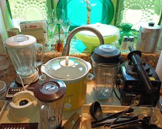Kitchen tools and appliances.   Uranium glass - no, it's plastic