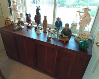 Solid wood buffet and asian figurines