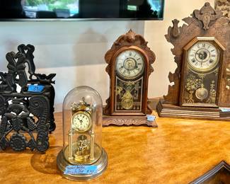 Black wrought iron magazine holder $45
Brass domed Gustav Becker Medaille D’or click $300
Smaller Eastlake Clock w/ key  $60 sold
Large Eastlake clock with key $50