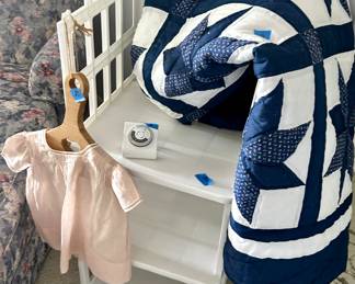 1 Twin quilt $18
Storage bins $3ea
Baby dress with wood display hanger $8