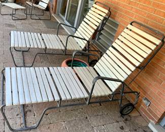 Vintage wrought iron, rubber like coated strap chaise lounge chairs $115 each