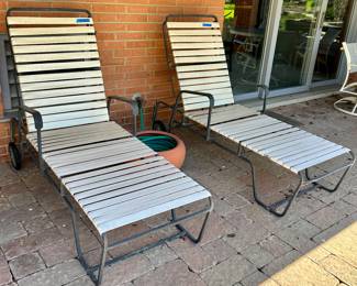 Vintage wrought iron, rubber like coated strap chaise lounge chairs $115 each