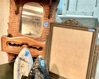 Eastlake wooden mirror with shelf $45, Iron $20 each 
vintage brass swivel frame $20