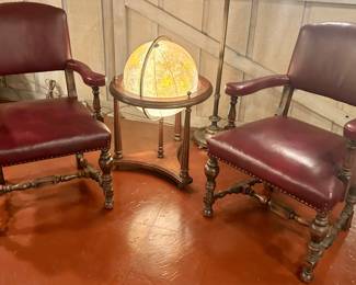 *Vintage Burgundy Leather arm chairs with brass grommet trim 26w x 20d x 18 floor to seat $145 ea
*Vintage lit globe 22 Rnd x 32”h Table $185