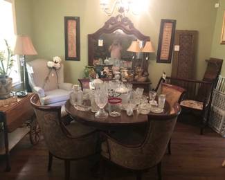 round table with chairs, settee, gates, screen, foyer table with mirror