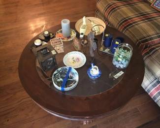 one of 3 coffee tables, candles, plates