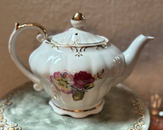 Antique porcelain flowered tea pot