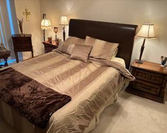 Leather Headboard, bed with bedding, matching night stands
