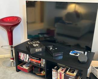 Flat screen smart tv, bar stool, entertainment center 