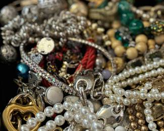 Trays of necklaces, bracelets, and much more jewelry