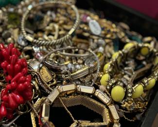 Trays of bracelets, bangles, necklaces, jewelry