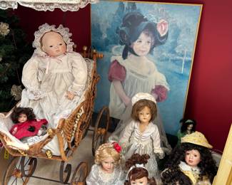 Antique baby carriage, dolls