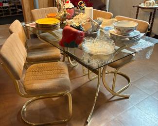 Fantastic Mid Century Modern gold cantilever chair dining set