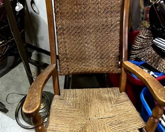 Beautiful antique rocker with caned