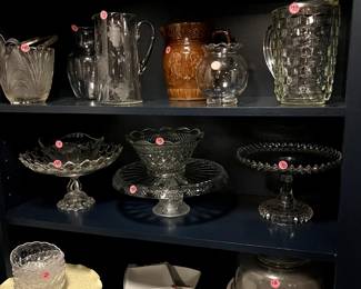 Lots of crystal pitchers, cake plates, glassware, too much to show it all
