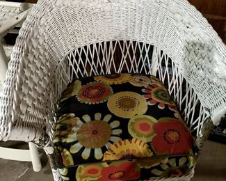 Beautiful Antique wicker chair...we have more of this great upholstery material!