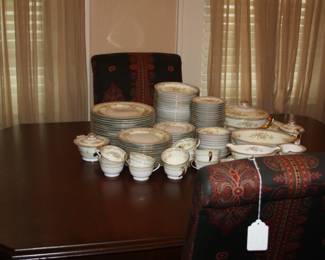Antique Buffet cabinet, matching Dining table with 4/leaves, 4-leather/wood side chairs, 5-upholstered dining side chairs. large set of Noritaki China